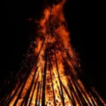 Traditional bonfire lit during the Night of San Juan in Spain, symbolizing purification and renewal