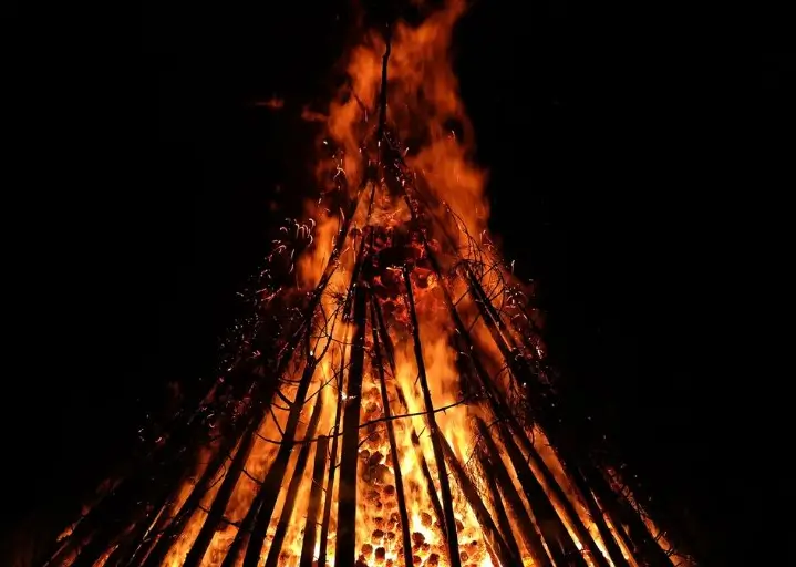 Traditional bonfire lit during the Night of San Juan in Spain, symbolizing purification and renewal
